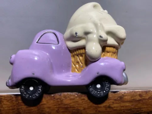 Purple diecast ice cream truck with white elephant scoop and cone holder