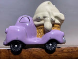 Purple diecast ice cream truck with white elephant scoop and cone holder