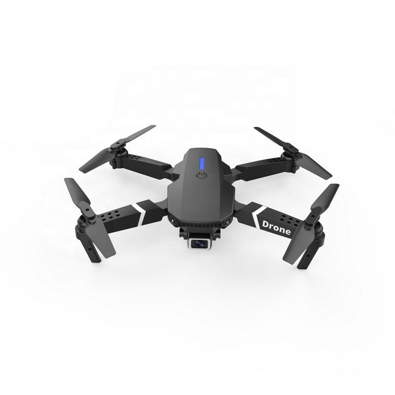 Mini black quadcopter drone with four propellers and front camera module