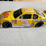 Yellow NASCAR diecast race car, number 3, detailed decals and black wheels