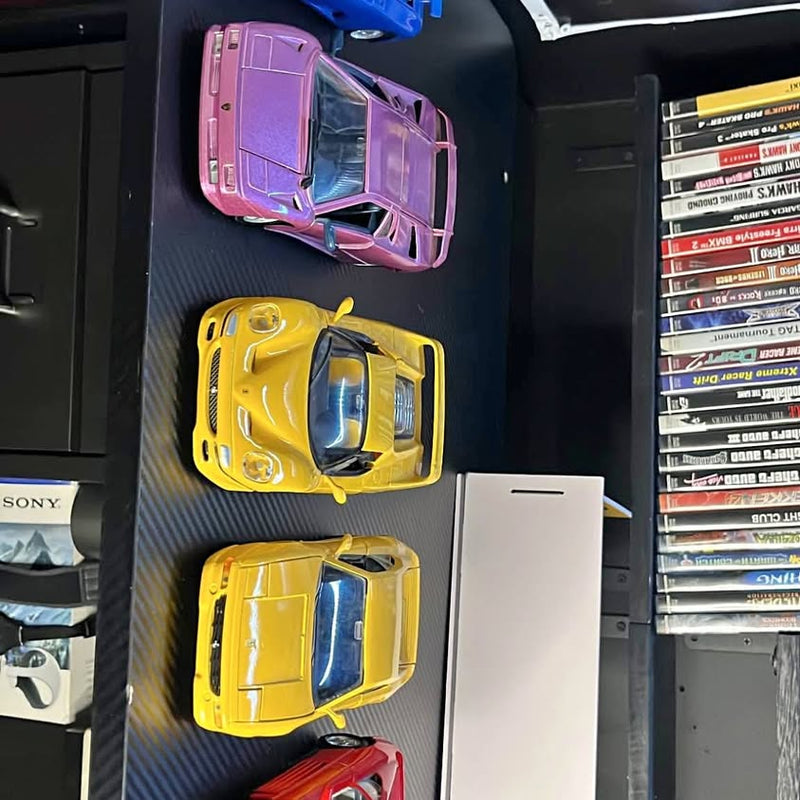 Diecast cars set with purple and yellow miniature cars in tray