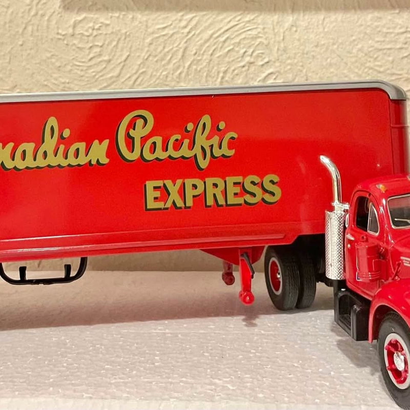 Vintage red Canadian Pacific Express diecast truck with front cab and grille