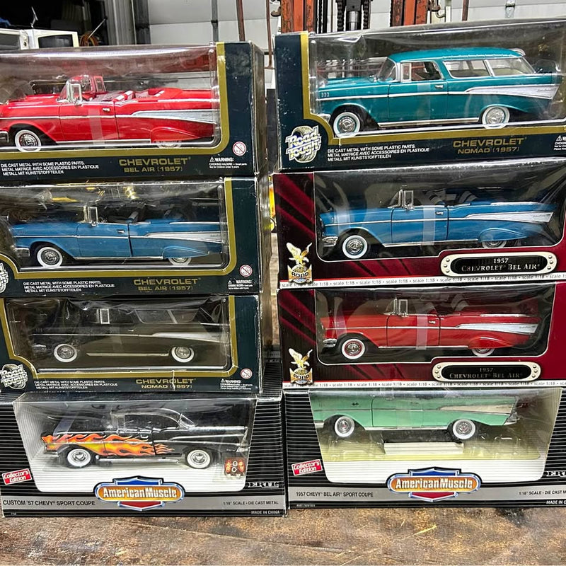 Diecast car display set in boxes, Chevrolet and American Muscle models in red, blue, green