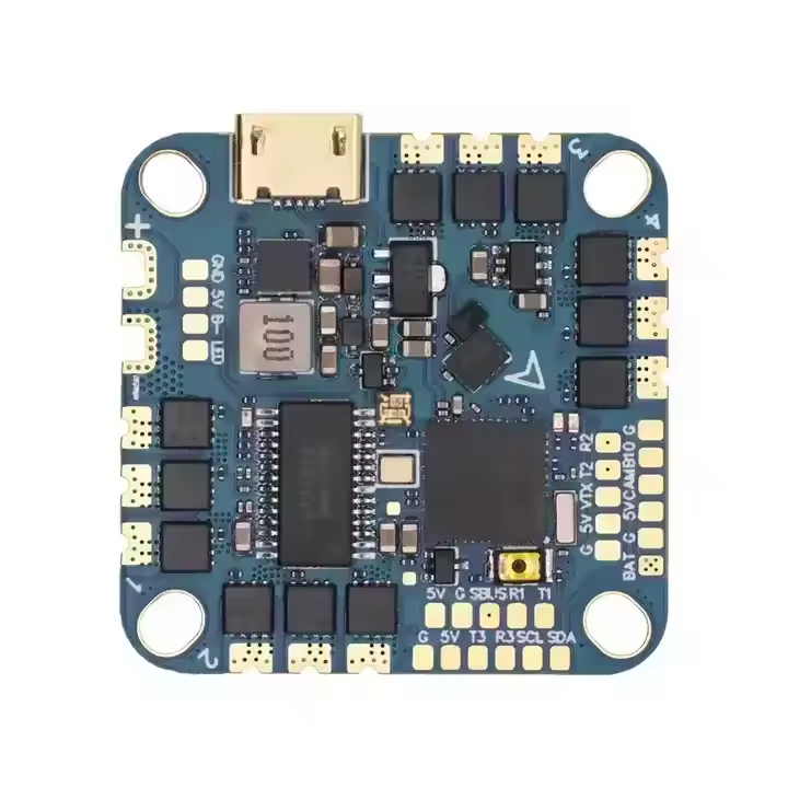 Flight controller circuit board with ESC components, blue PCB and mounting holes