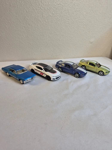 1:36 diecast pull-back toy car set of four, blue, white, navy, and green cars