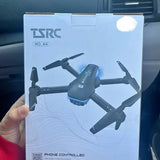 Phone-controlled quadcopter drone in product box, 4 propellers and camera symbol
