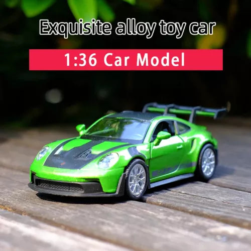 Green 1:36 alloy diecast sports car model with pull toy, front 3/4 view