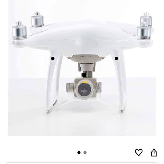 DJI Phantom 4 Pro drone with white quadcopter body and front camera gimbal
