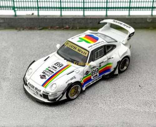1:64 scale white diecast race car with rainbow stripe and number 89, front 3/4 view