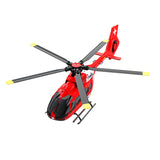 RC helicopter model with red body, black rotor hub, four gray blades with yellow tips