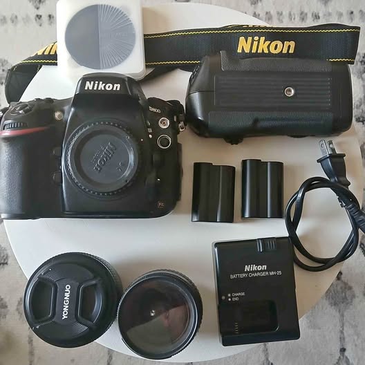 Nikon D800 DSLR camera kit with lens, strap, battery charger and accessories