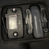 Drone kit in hard case with controller screen and folding propeller arms