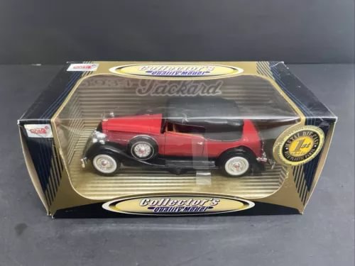 Red and black Packard convertible diecast model car in display box