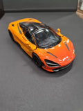 Orange diecast toy sports car model in front 3/4 view