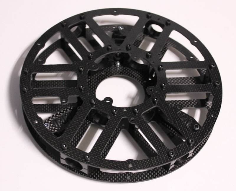 Carbon fiber drone frame plate with radial cutouts, round disc