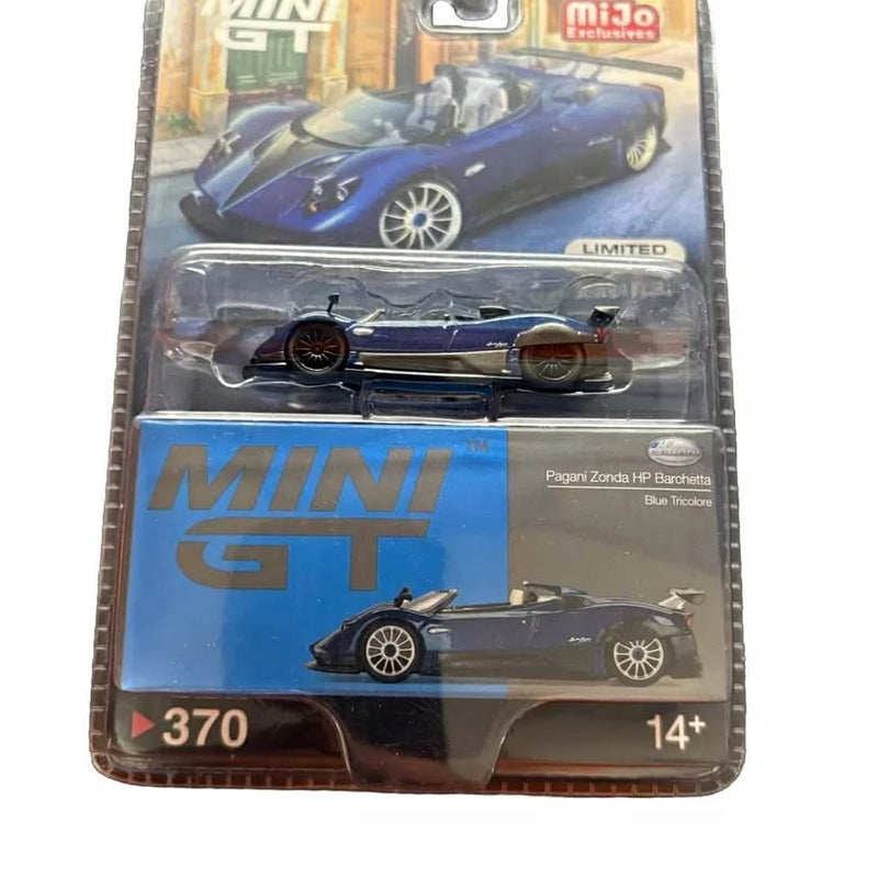 Mini GT diecast race car model in blue tricolor, in blister pack (1:64, 14+)