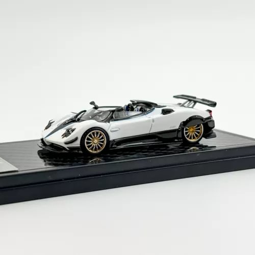 1:64 scale white sports diecast model car with rear wing detail