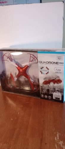 6-axis gyro drone in retail box, red quadcopter with propellers