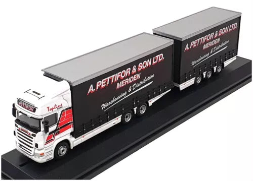 Diecast tractor-trailer model with white cab and black box trailer, 1/76 scale