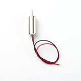 Mini coreless brushed motor with red and black wires, cylindrical metal body.