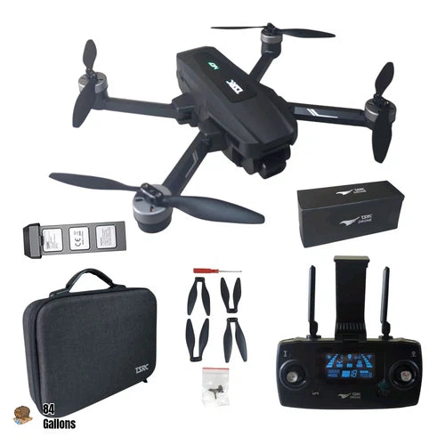 Black quadcopter drone with four propellers, remote controller, and carrying case set