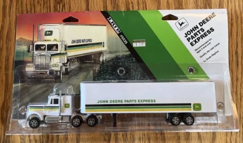 John Deere Parts Express diecast truck with white cab and green trailer panel