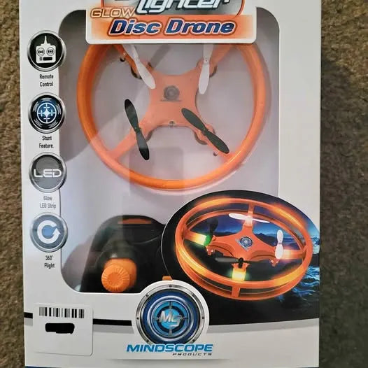 Disc drone in retail box with orange LED ring and four propellers