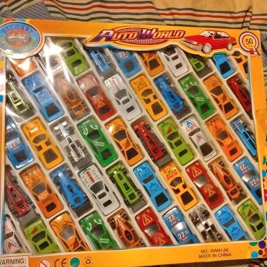 50-piece diecast metal and plastic vehicle set in retail box, assorted colored cars and trucks