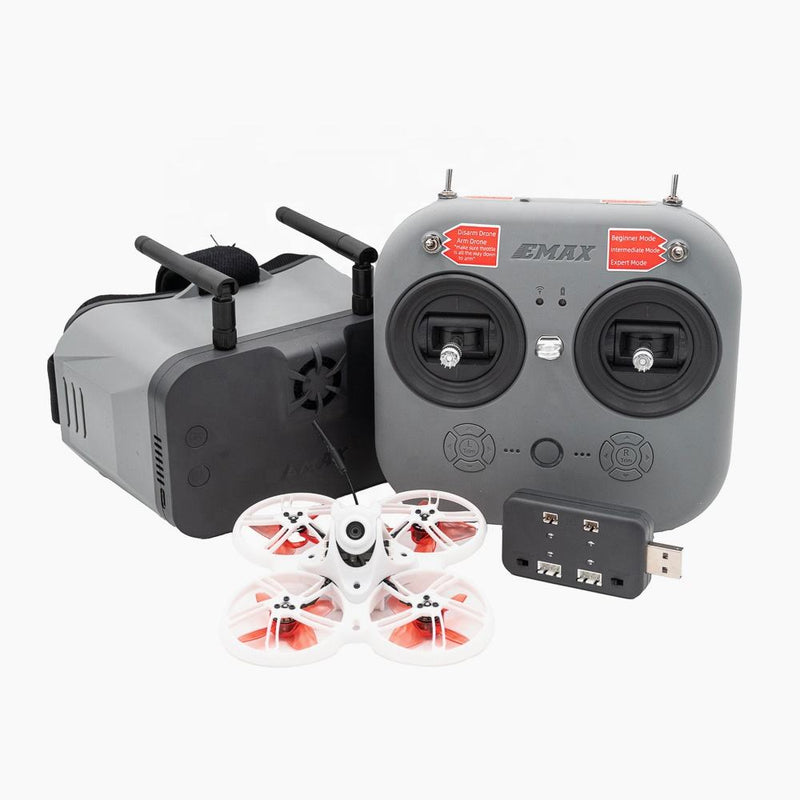 FPV racing drone kit with gray controller, white quadcopter and propeller guards