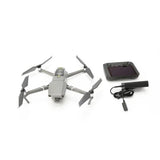 Foldable quadcopter drone with smart controller and handheld remote