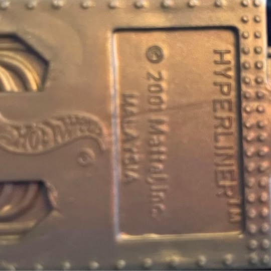 1:64 die-cast black van side close-up with Hyperliner label and door details