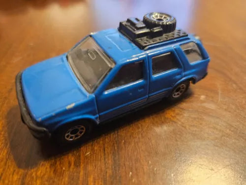 Blue 1994 diecast SUV model with black roof and detailing