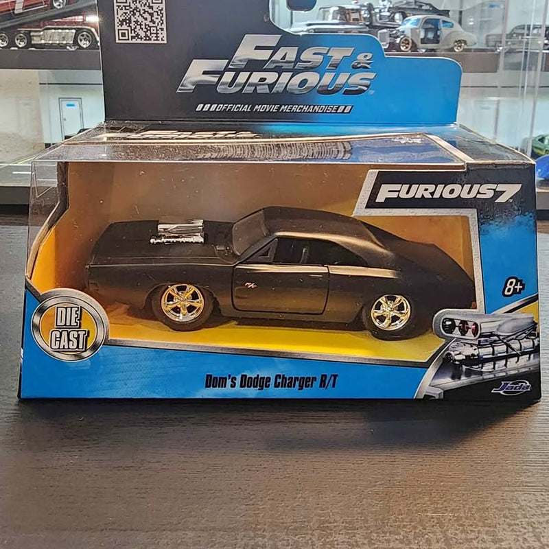 Fast & Furious diecast car box, black with gold wheels, 8+ age label