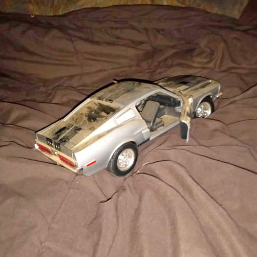 Silver Mustang 500 Shelby diecast car model, rear three-quarter view, detailed wheels
