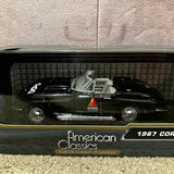 Black and silver die-cast convertible car with CTGT plate