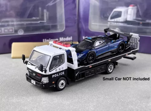 Police tow truck diecast model with flatbed, white cab and black chassis, blue car on bed