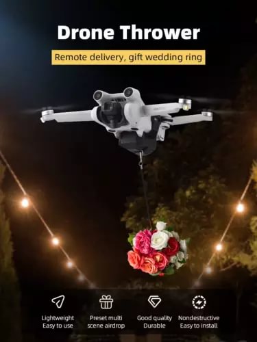 White drone airdrop thrower with payload basket and quick release arm