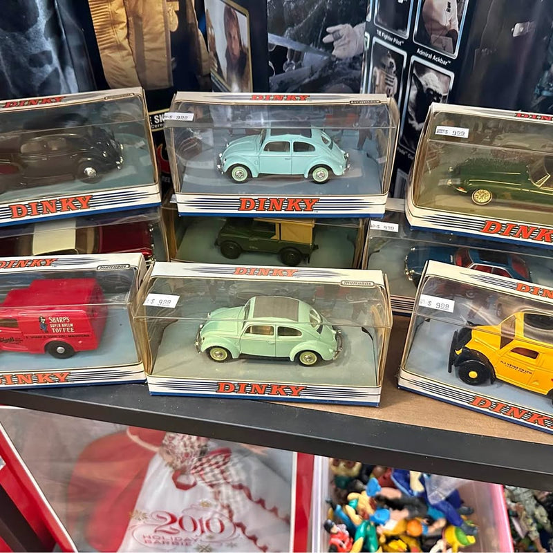 Mint green classic diecast car in clear DINKY display box with red logo