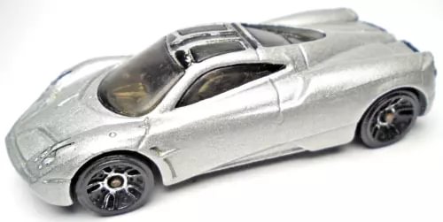 Silver diecast sports car with black wheels and black interior