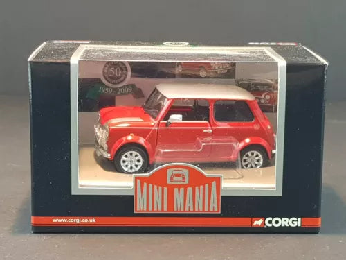 Red Mini Mania diecast mini model car in display box, front three-quarter view