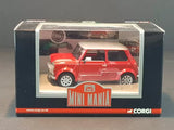 Red Mini Mania diecast mini model car in display box, front three-quarter view