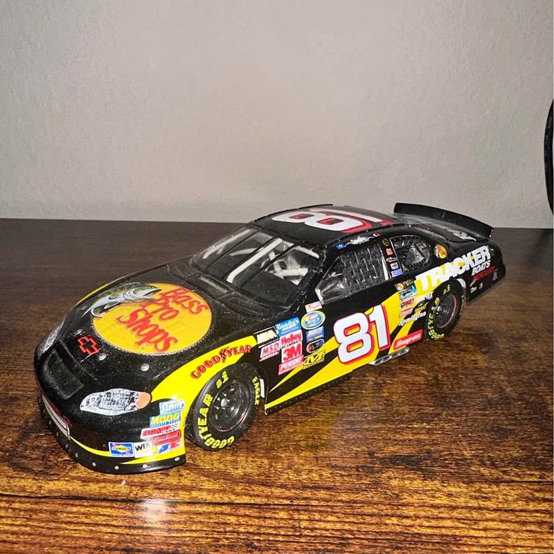 1/24 scale diecast NASCAR race car, number 81 Tracker Boats, black with yellow accents