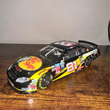 1/24 scale diecast NASCAR race car, number 81 Tracker Boats, black with yellow accents