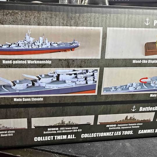 Diecast ship model in display box with painted deck details