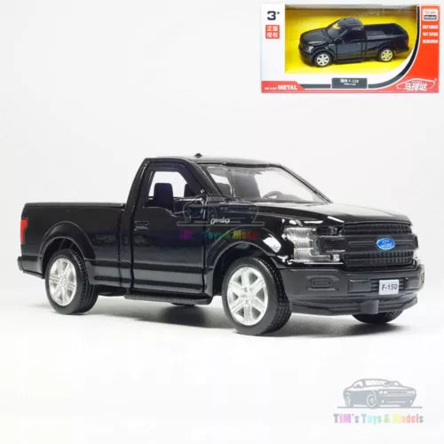 Black pickup truck diecast model car with silver wheels, front view