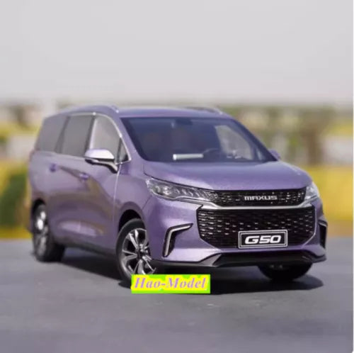 1:18 diecast MPV model car, purple front view with grille and headlights
