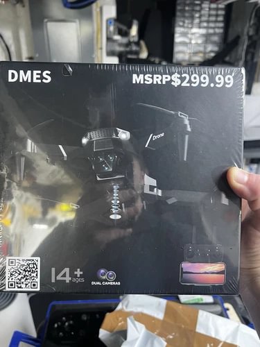 DMES P13 Pro drone box with dual HD camera and quad-rotor illustration