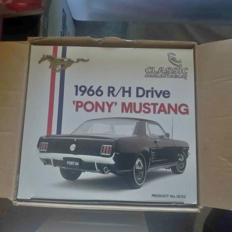 Diecast 1/18 scale 1966 Mustang model car in original box, black