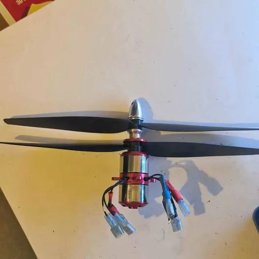 Contra-rotating drone BL motor mount with propeller blades and wiring leads