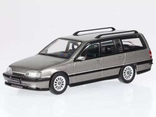 Grey metallic diecast station wagon model car with front-left and side windows visible